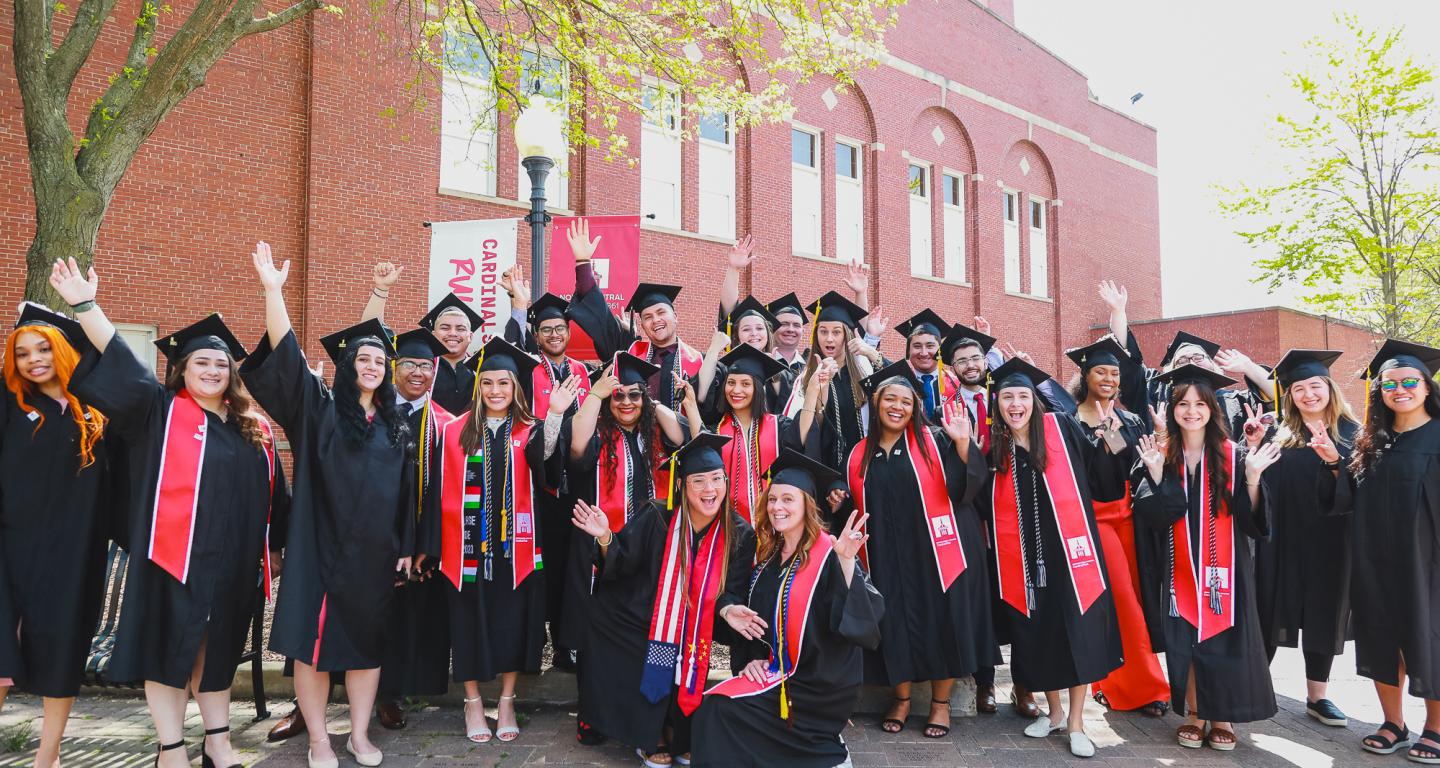 A group of North Central College graduates celebrating.