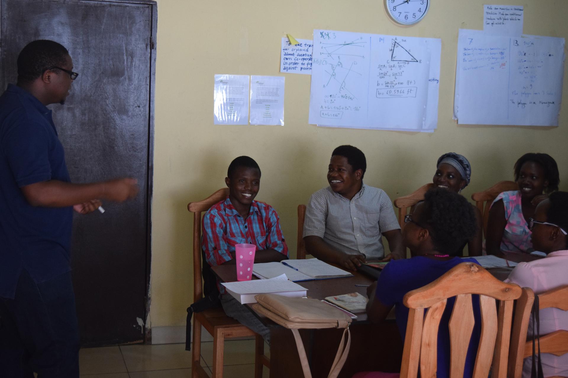 Gates Cambridge Scholar Etienne Mashuli teaching his students in the Tujenge Scholars Programme.