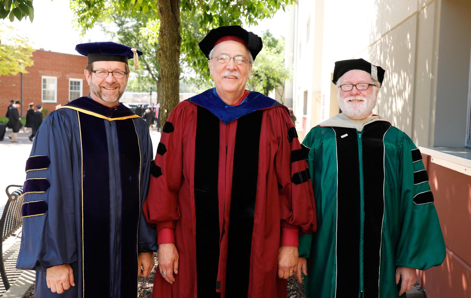 North Central College emeritus professors David Horner, James Donovan and Richard Paine.