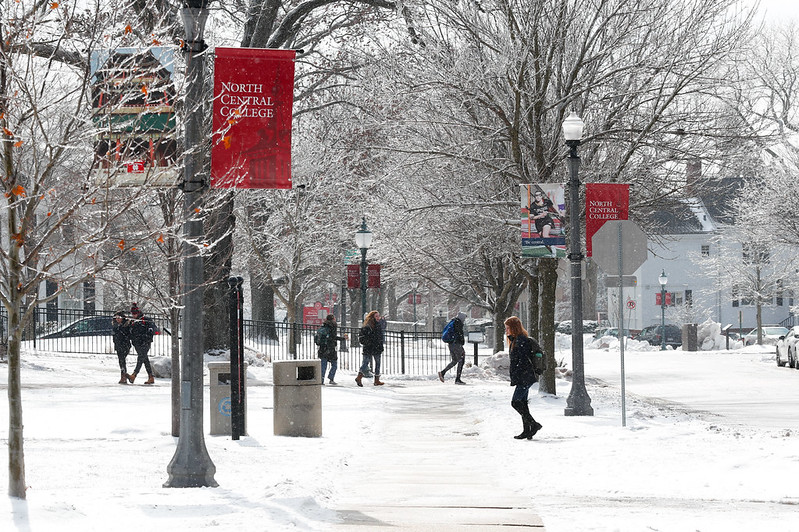 Students walking around campus in the snow