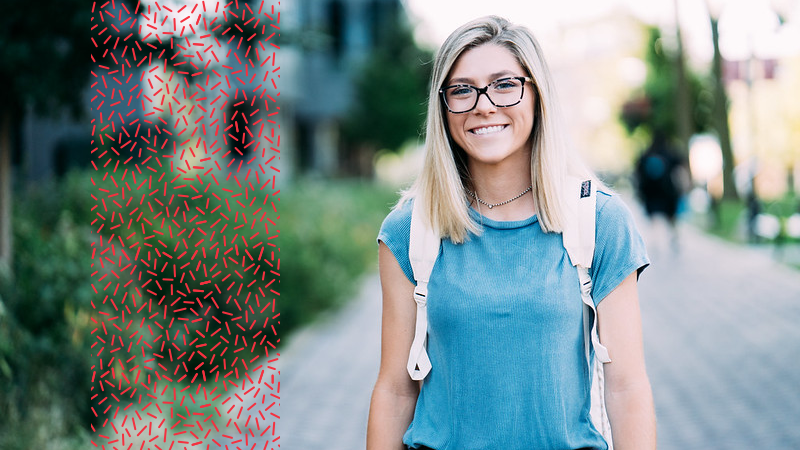 student walking on path