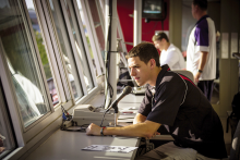 broadcaster in booth