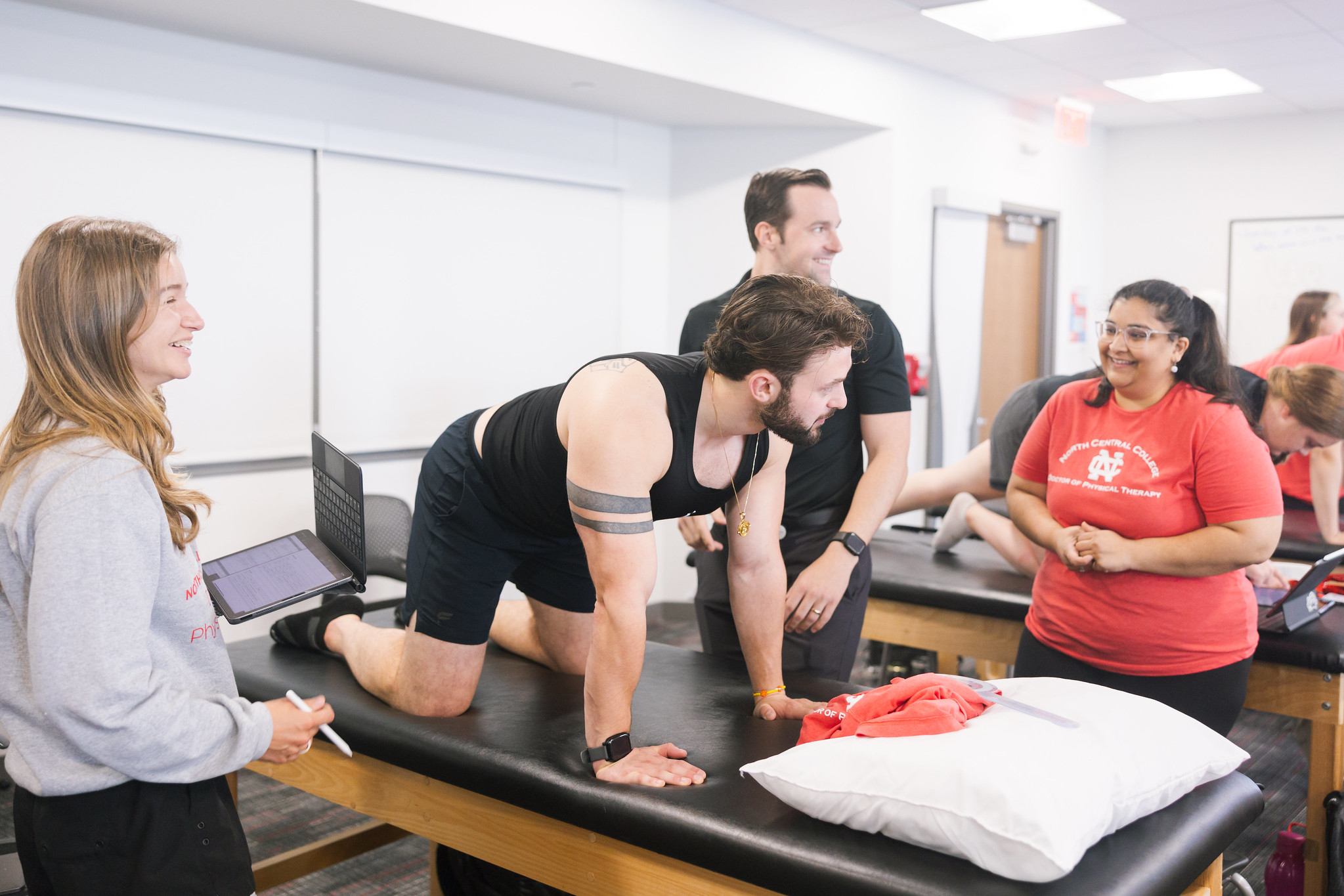 DPT students working on a lab on campus.