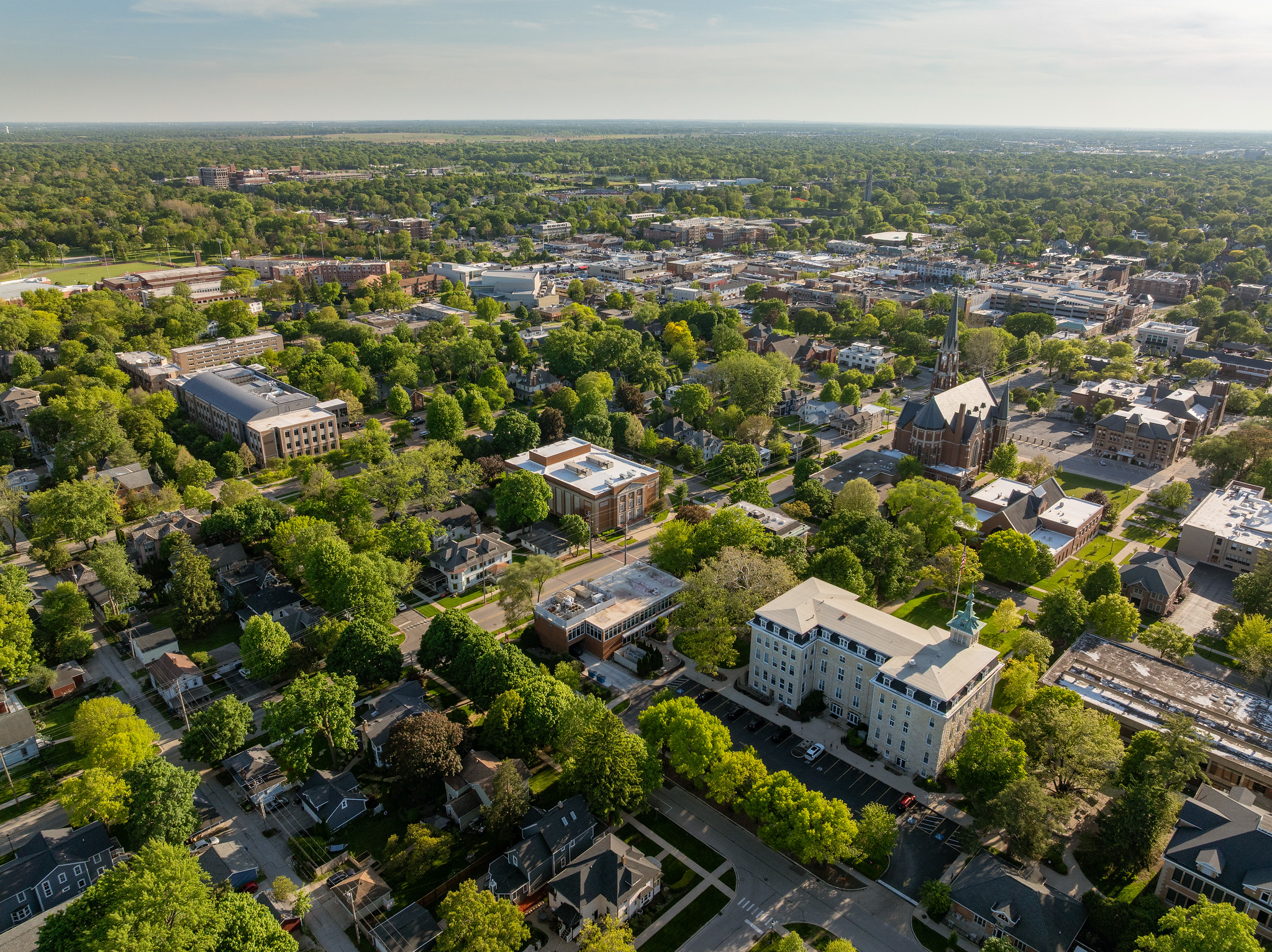 A drone still of campus on a sunny day.