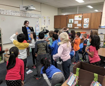 North Central Teach First student Nicole Avvisati leads students in an exercise.