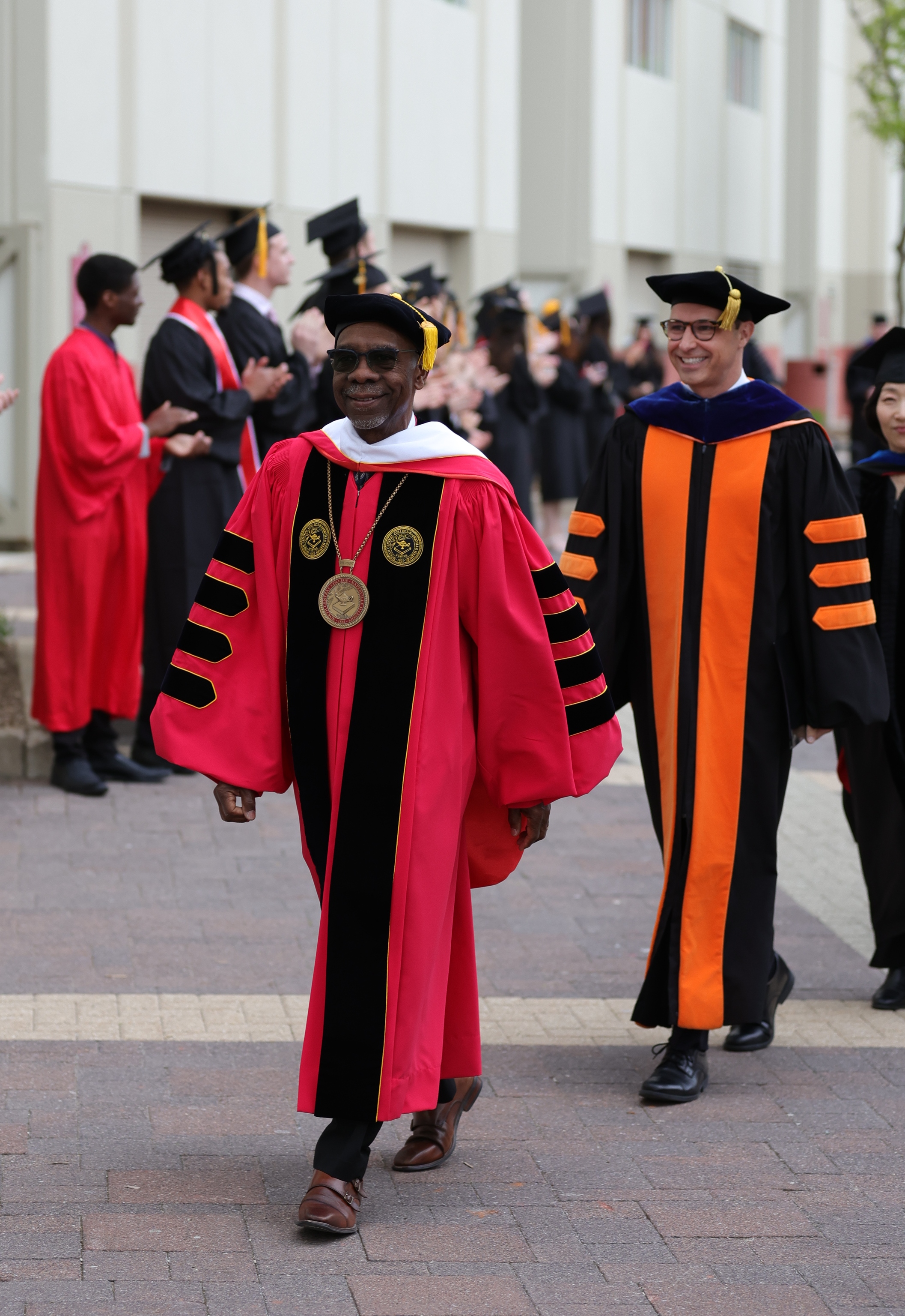 A photo of President G-P and Dr. Michael Lamb during the processional.