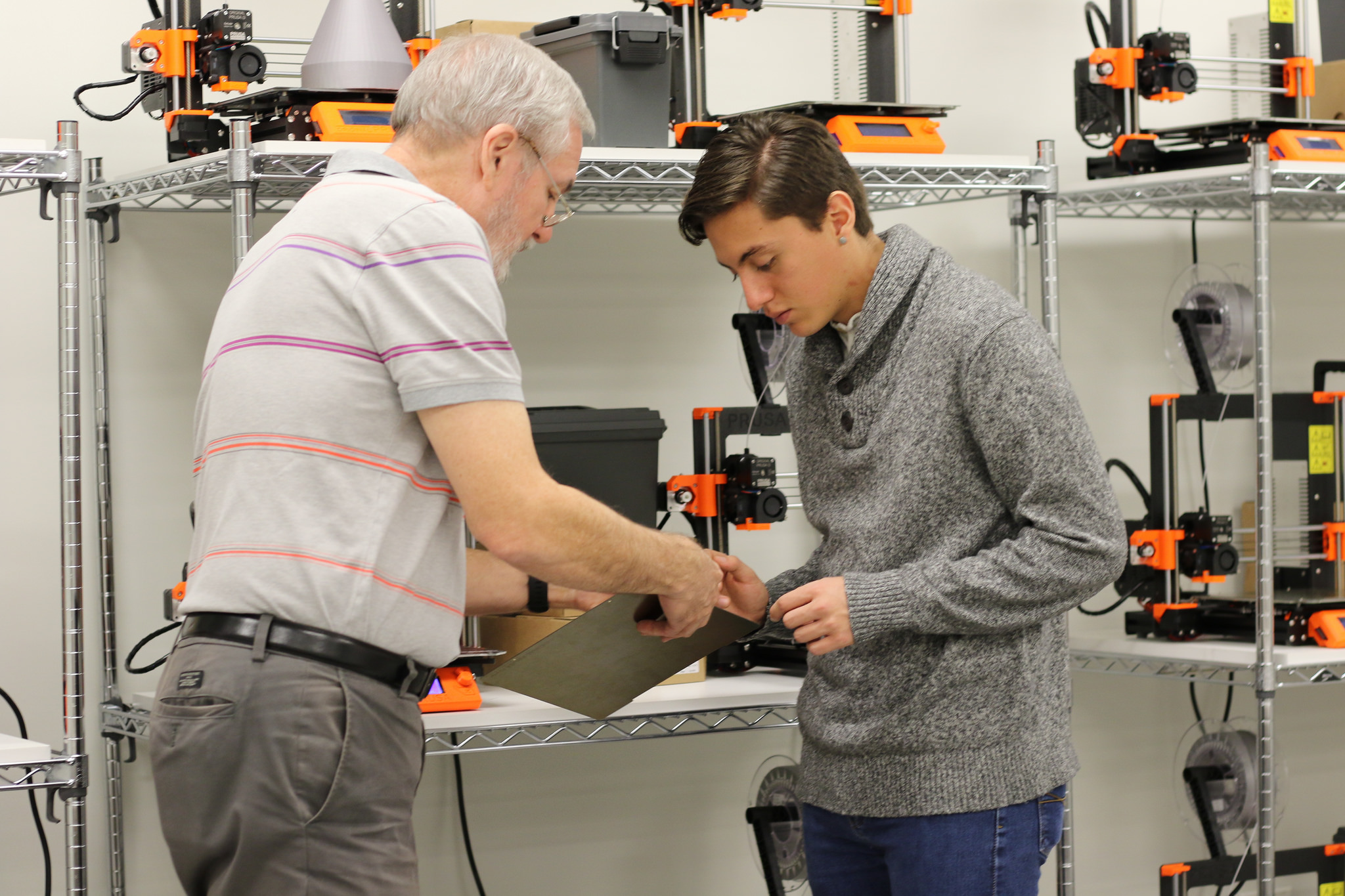 Professor and student in engineering class