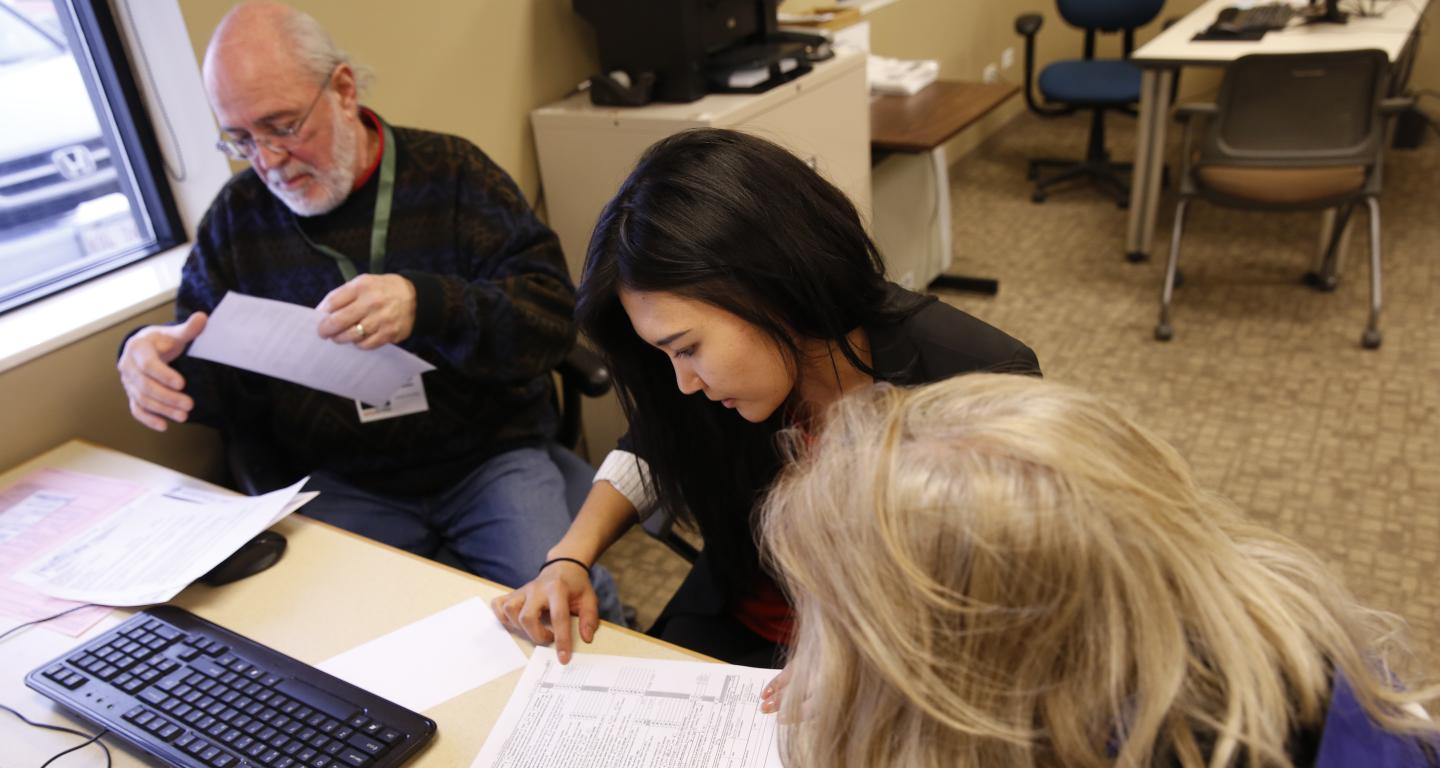 student helping with taxes