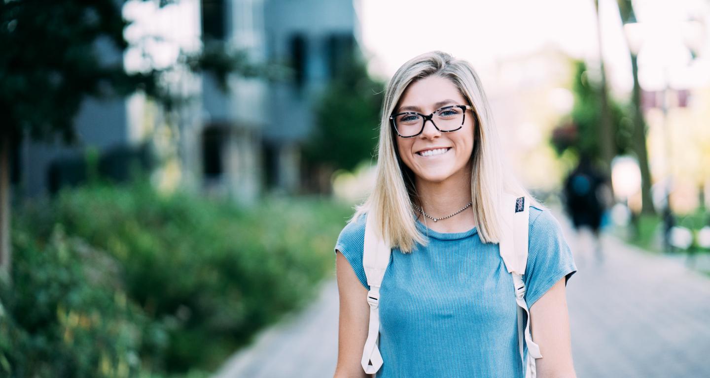 student walking on campus