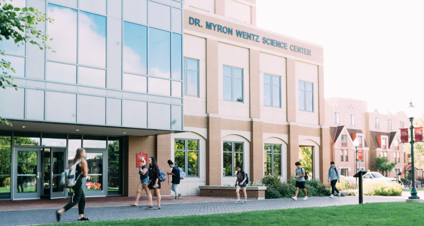 student walking on campus