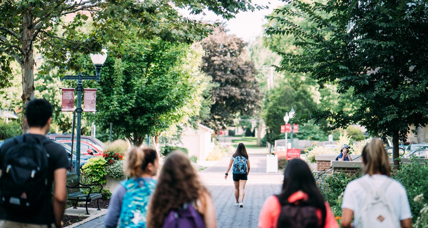 students walking on campus