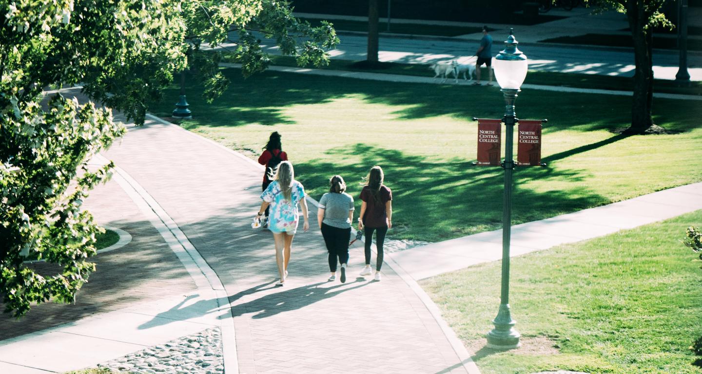 students walking on campus