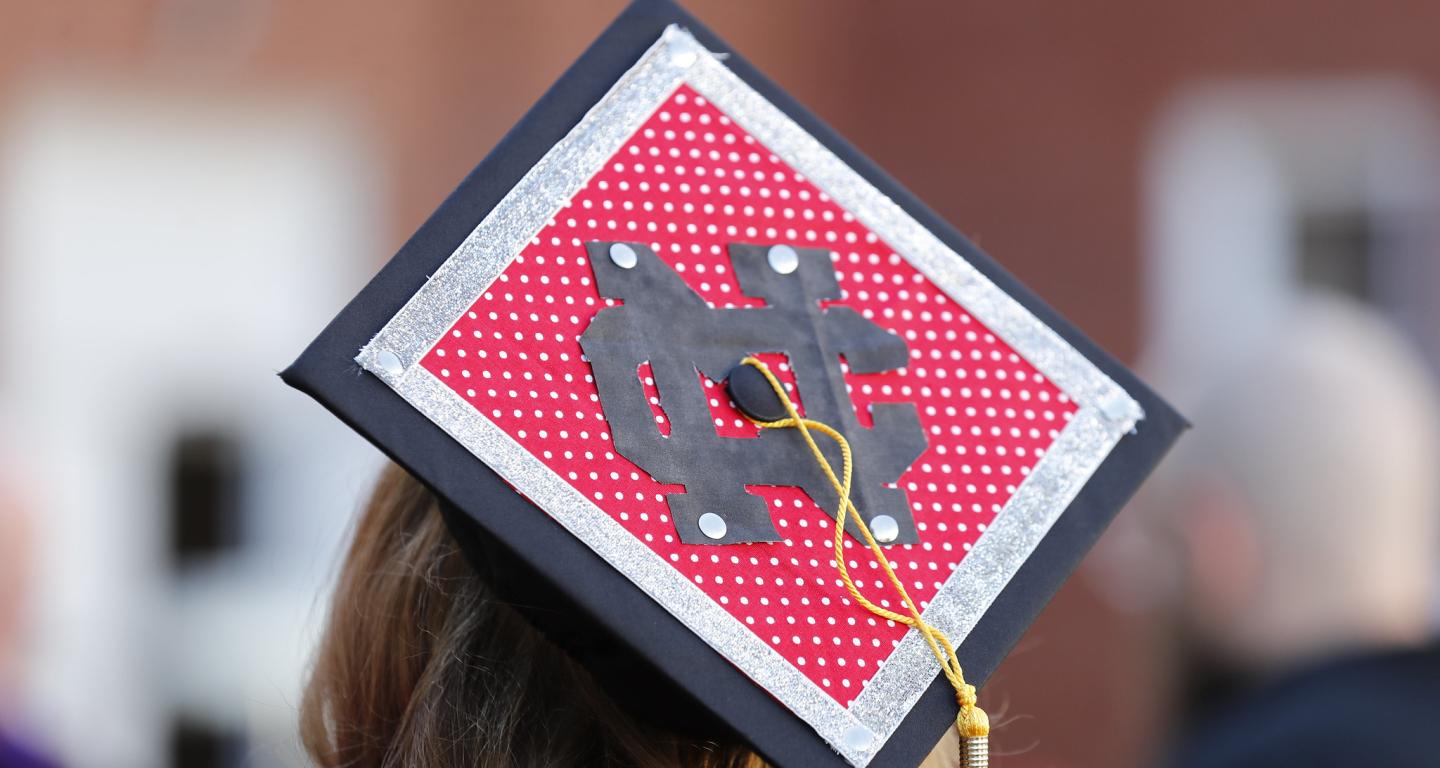 A mortarboard with a North Central College logo on it.