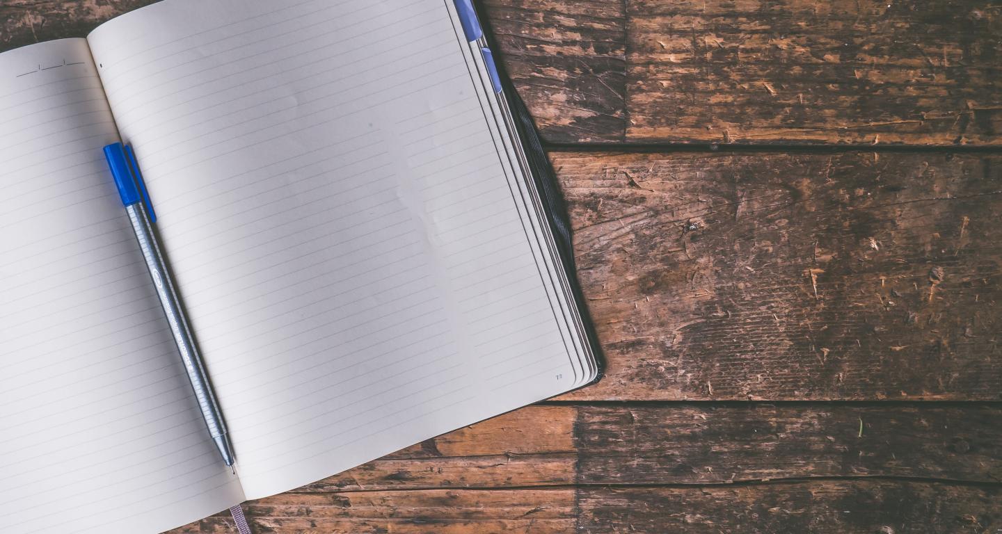 Notebook on wooden table