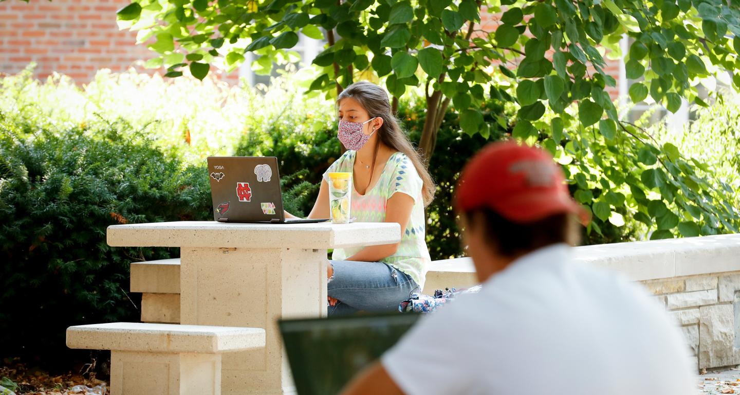 A North Central College student making her schedule.