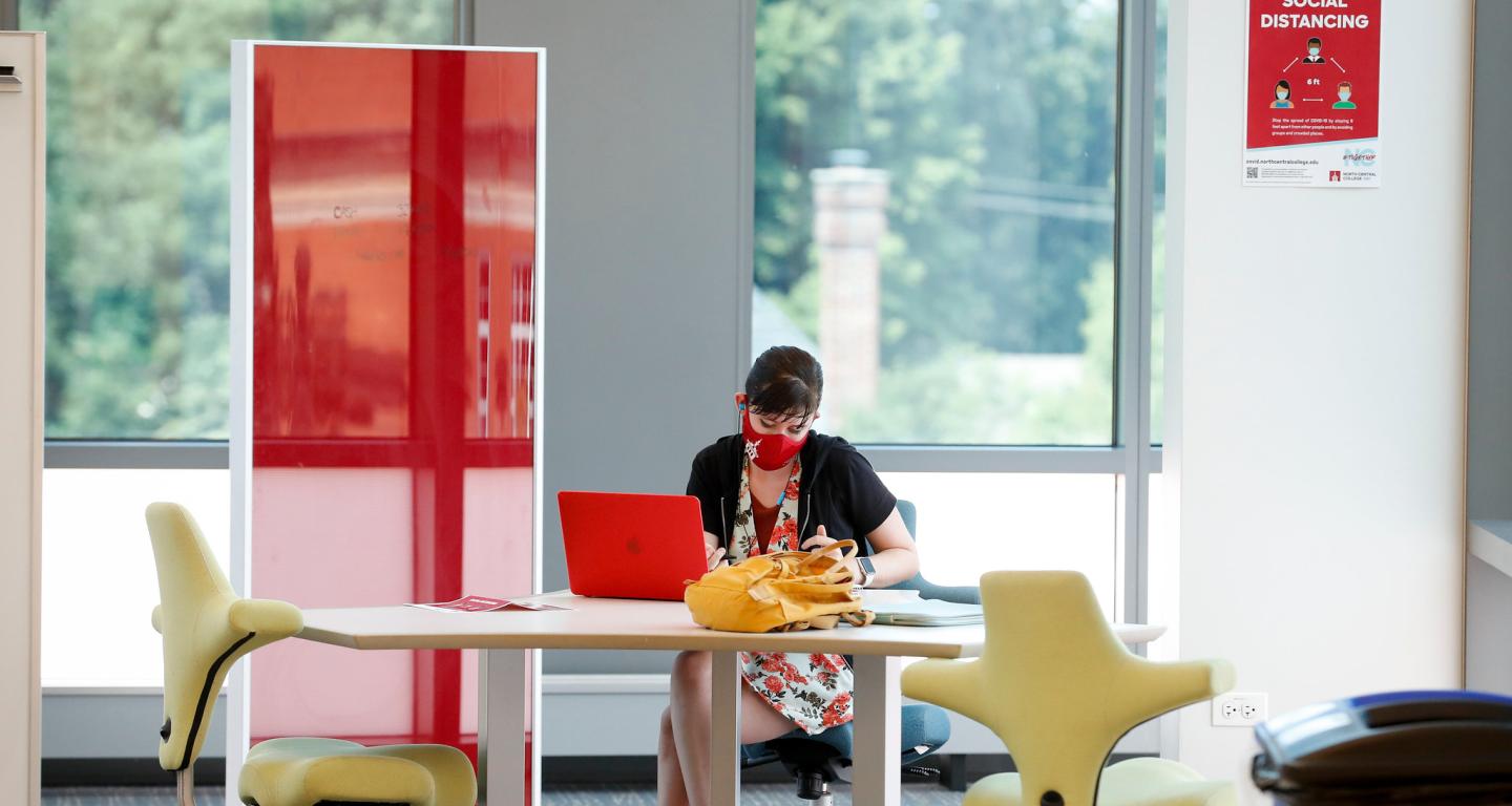 A political science student at North Central College studying.