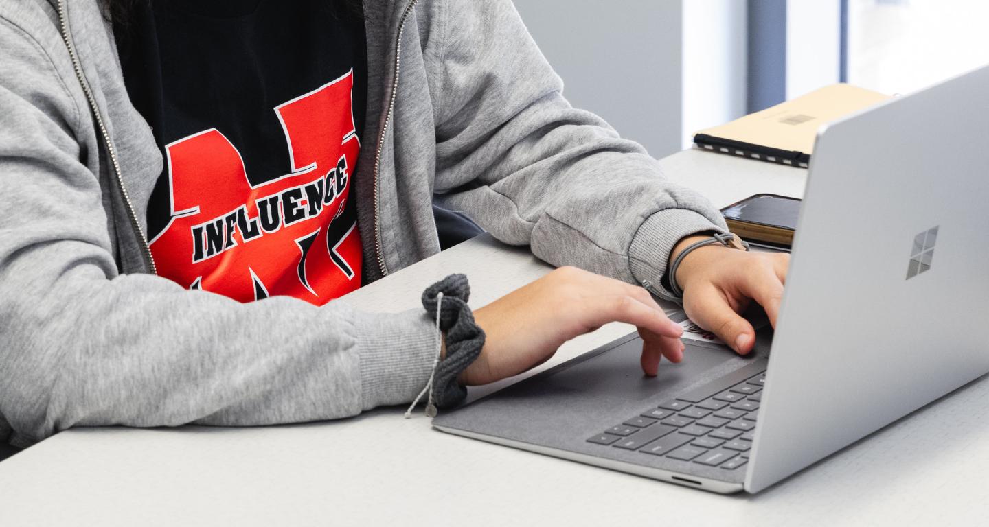 A North Central College computer science student uses a laptop.