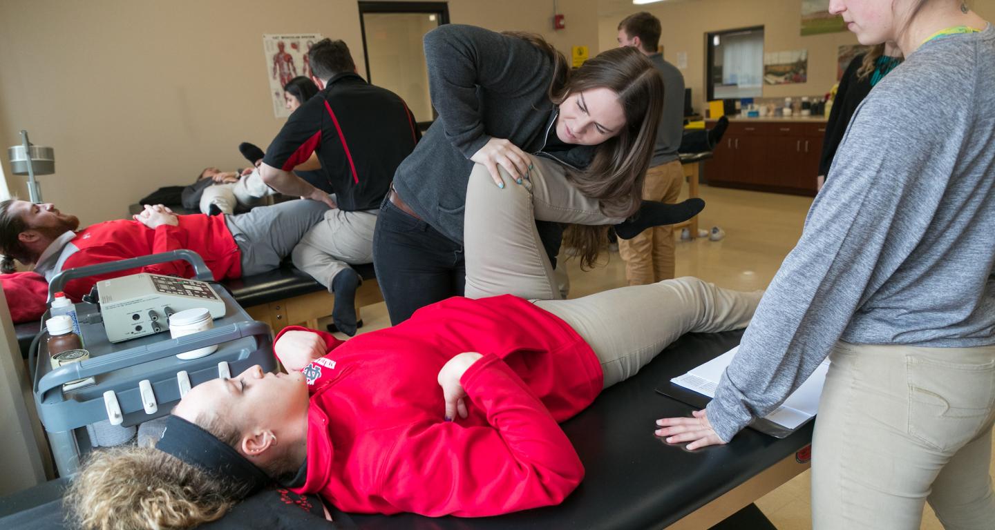North Central College athletic training students practice techniques.
