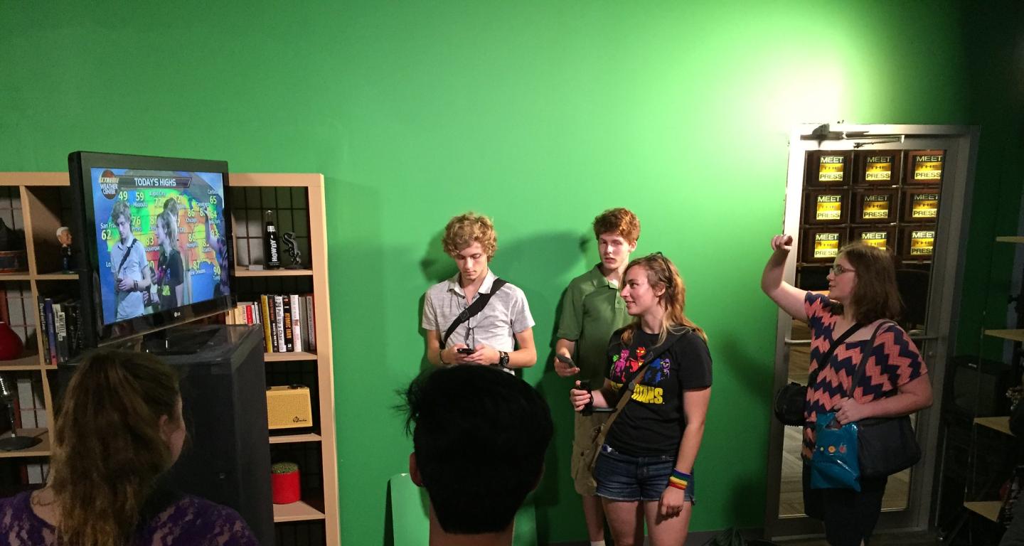 North Central College media studies students working with a green screen.