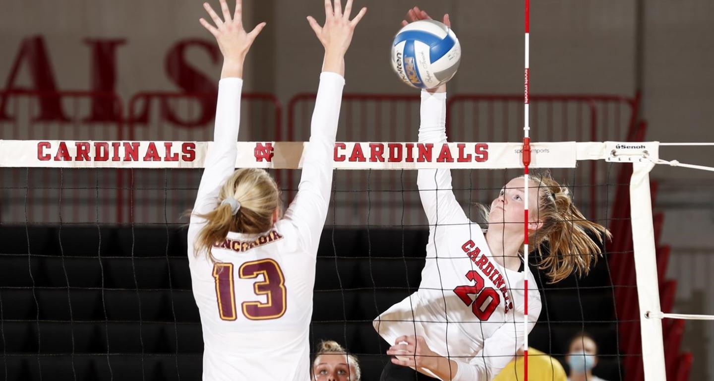 A member of the North Central College women's volleyball team in action.