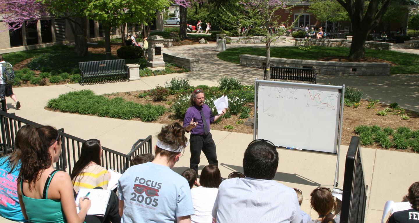 A North Central College professor teaching an actuarial science class.
