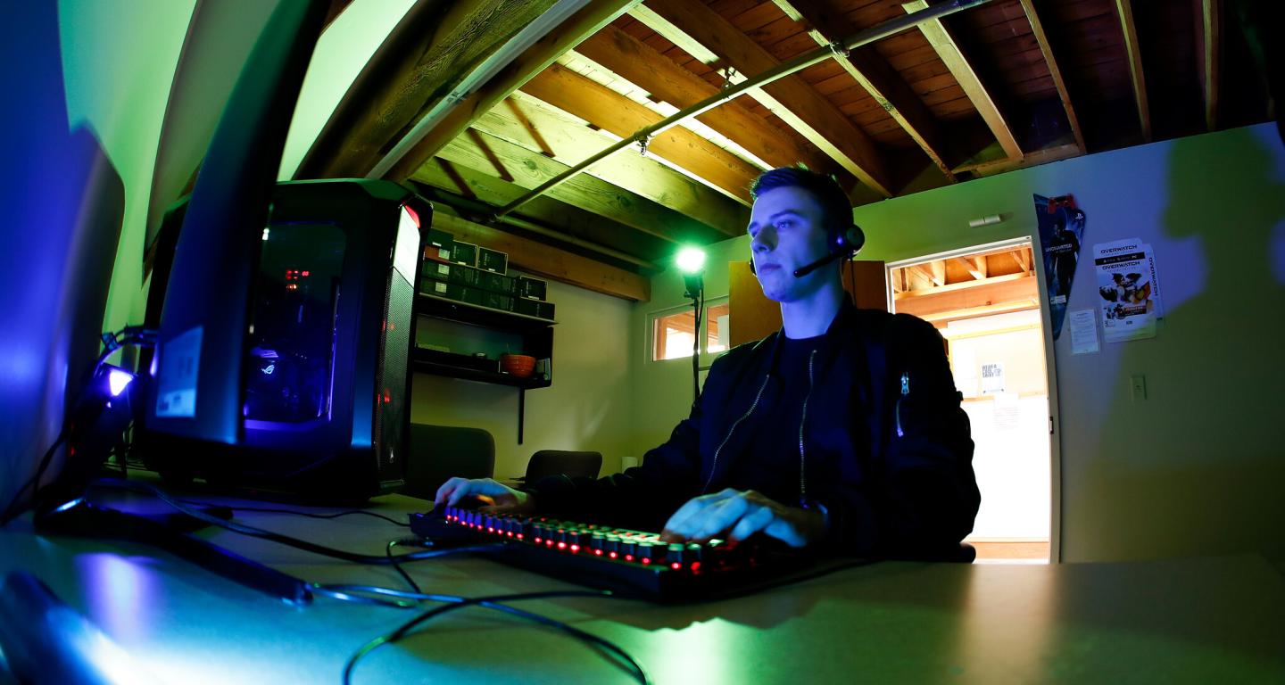 A North Central College computer science major working in a computer lab.