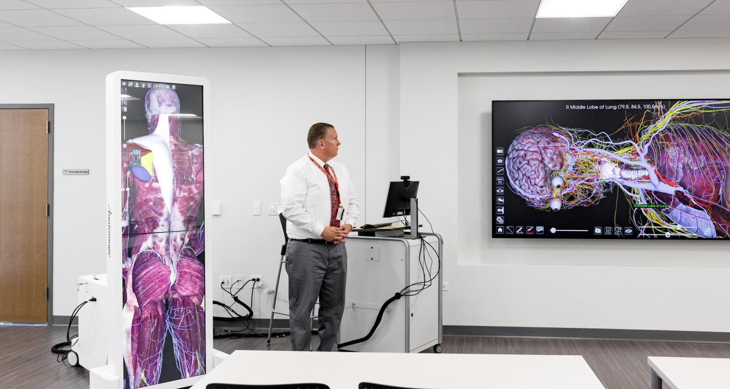 A North Central College health science professor teaching in a lab.