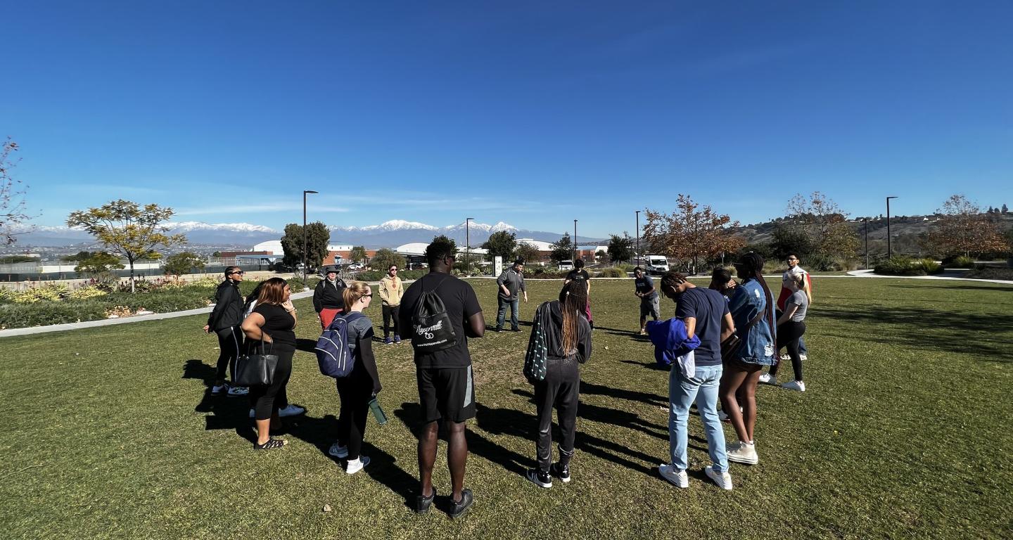 North Central College students enjoying spring weather on campus.