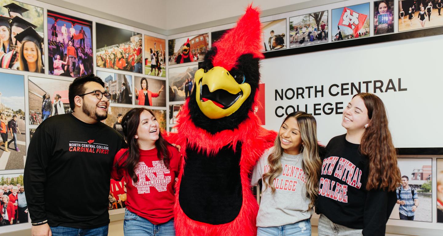 A group of undecided North Central College students with the College's mascot, Chippy.