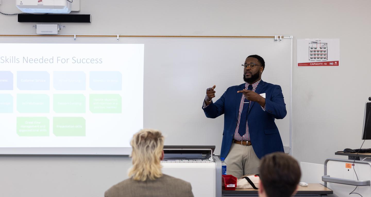 A North Central College criminal justice student giving a presentation.