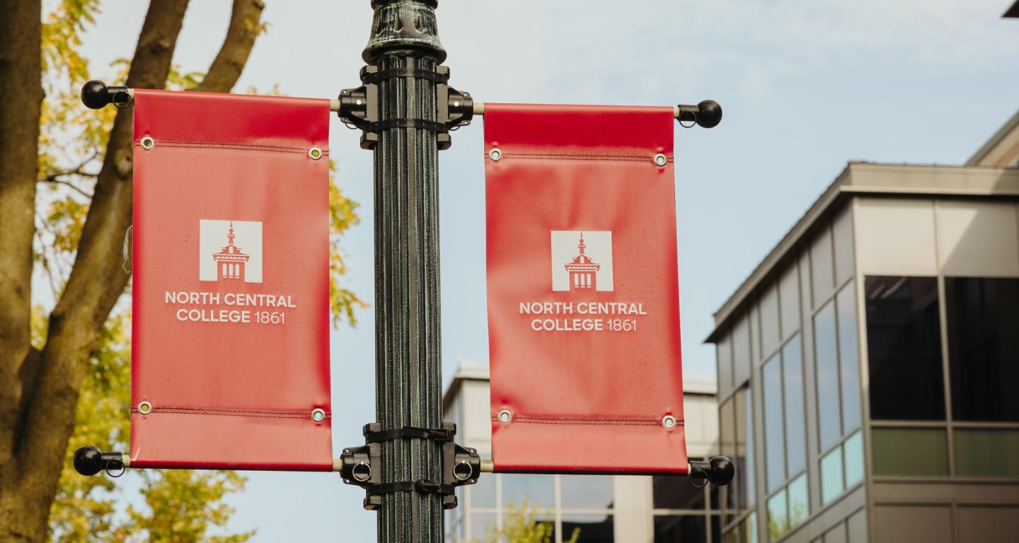 North Central College banners hanging on campus.