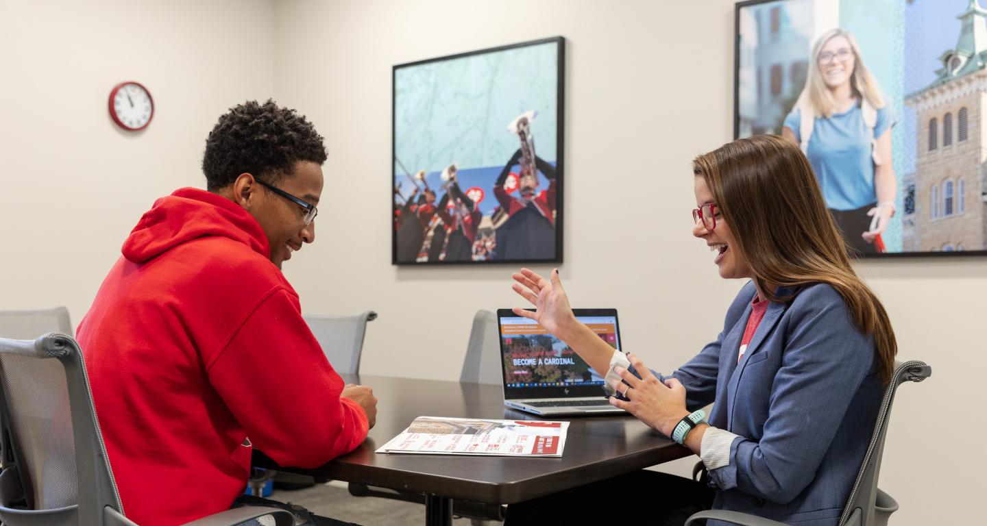 Two North Central College students engaging in dispute resolution.