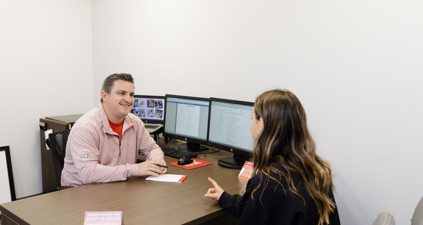 A North Central College student speaks with an HR professional.