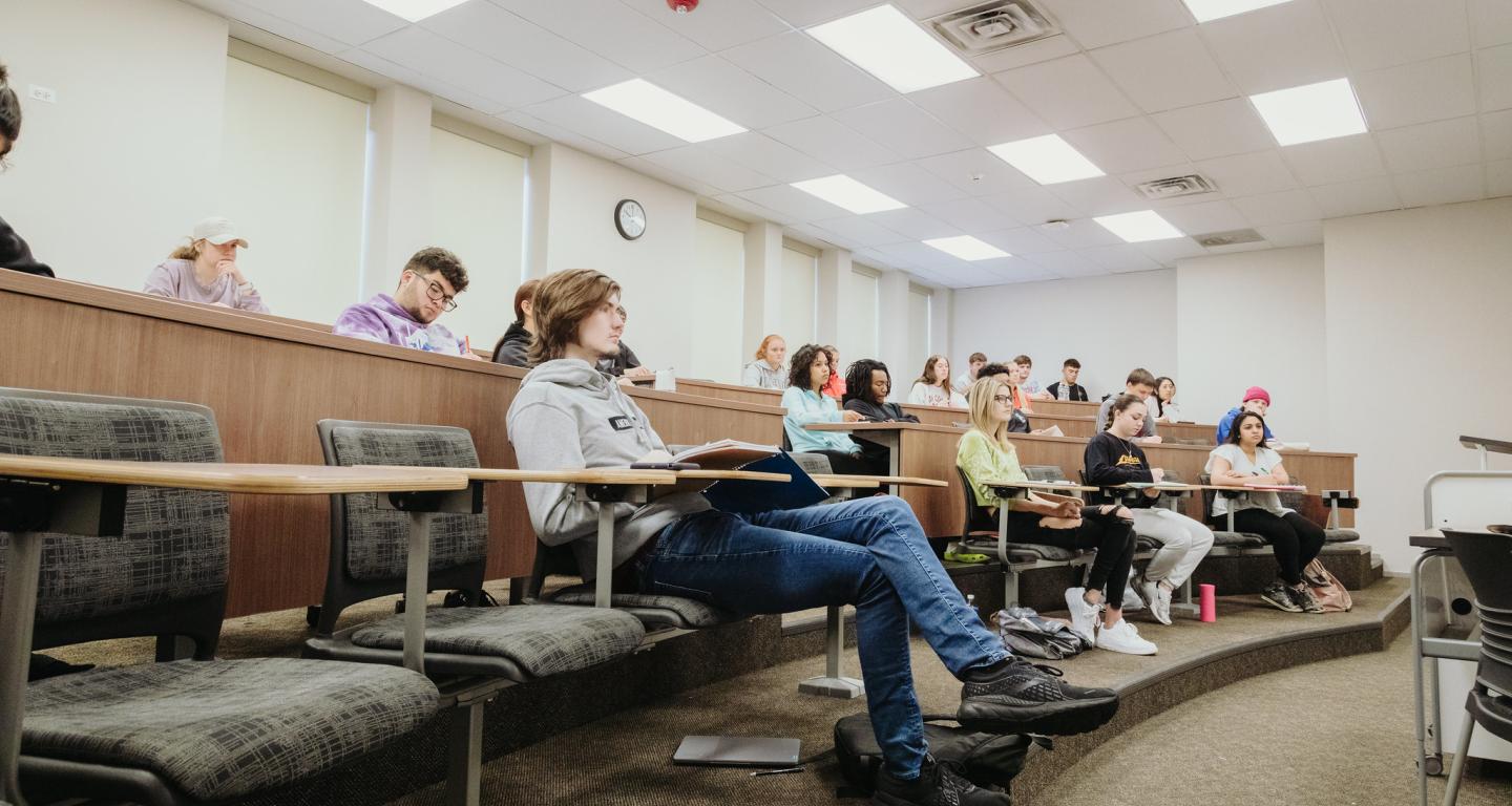 North Central College philosophy students taking a class.