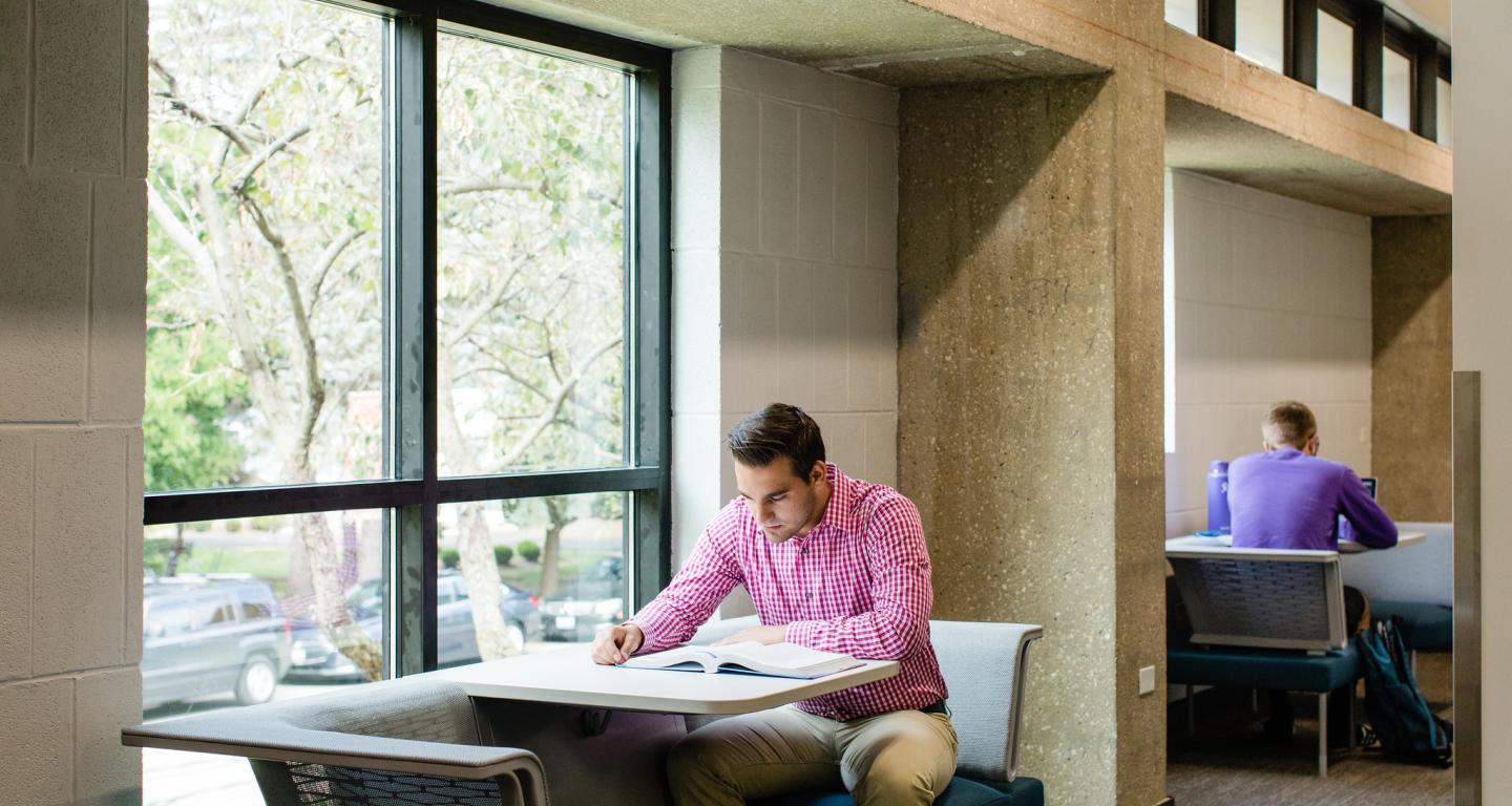A North Central College entrepreneurship student studying.
