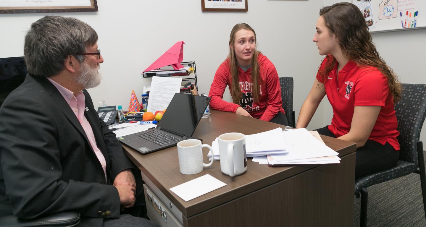 North Central College students discussing ethical leadership.