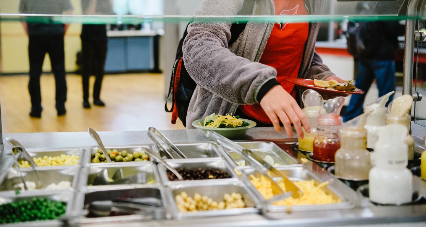 A North Central College student preparing a healthy lunch.