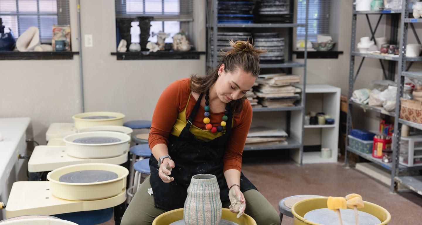A North Central College studio art student working on a project.