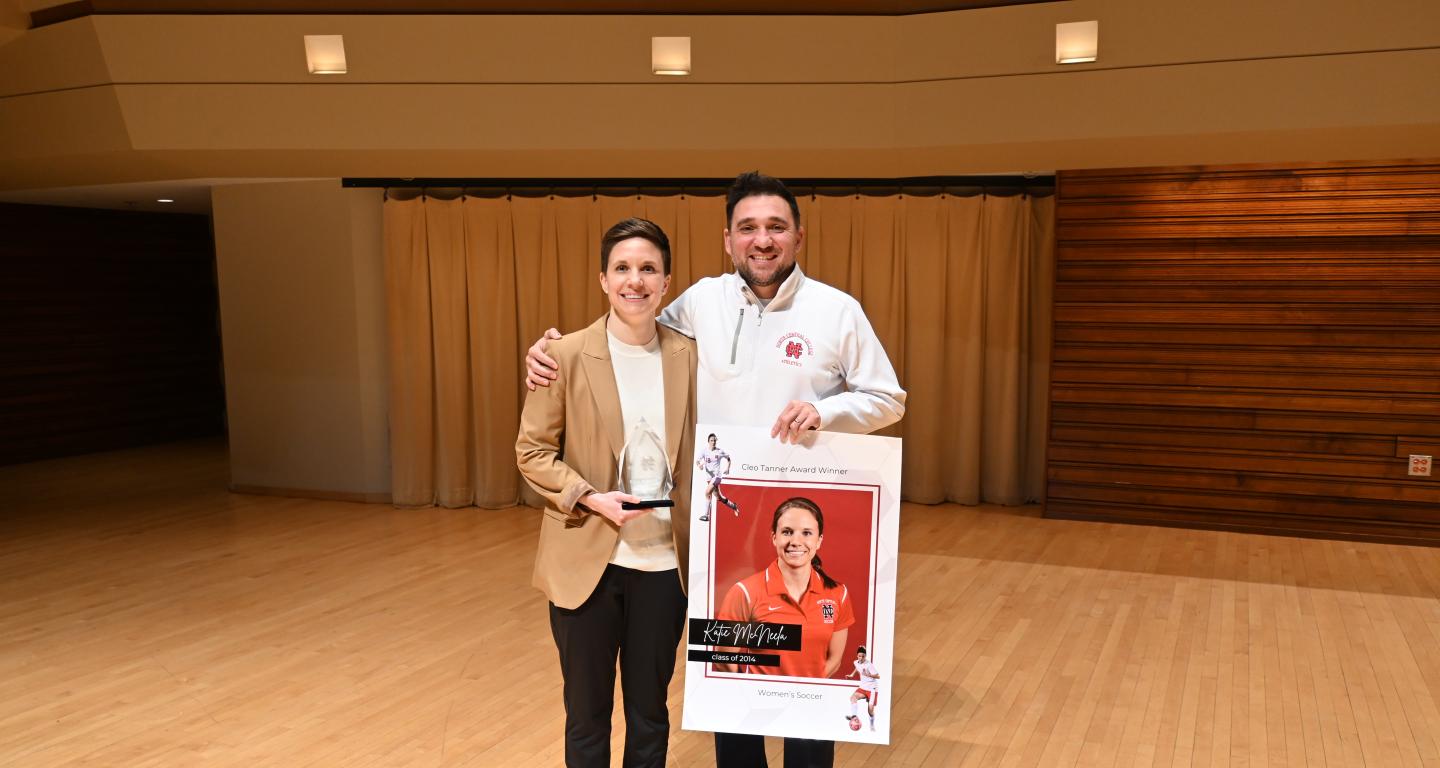 Katie McNeela with Andrew Gamarra, women's soccer head coach.
