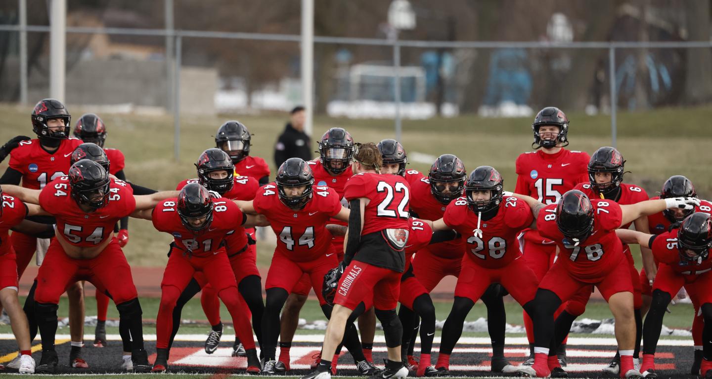 North Central football players in a huddle
