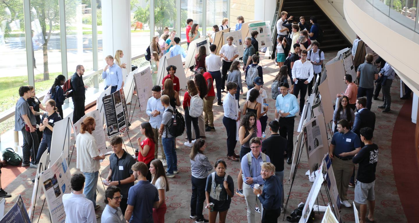 students and attendees at the research and internship showcase