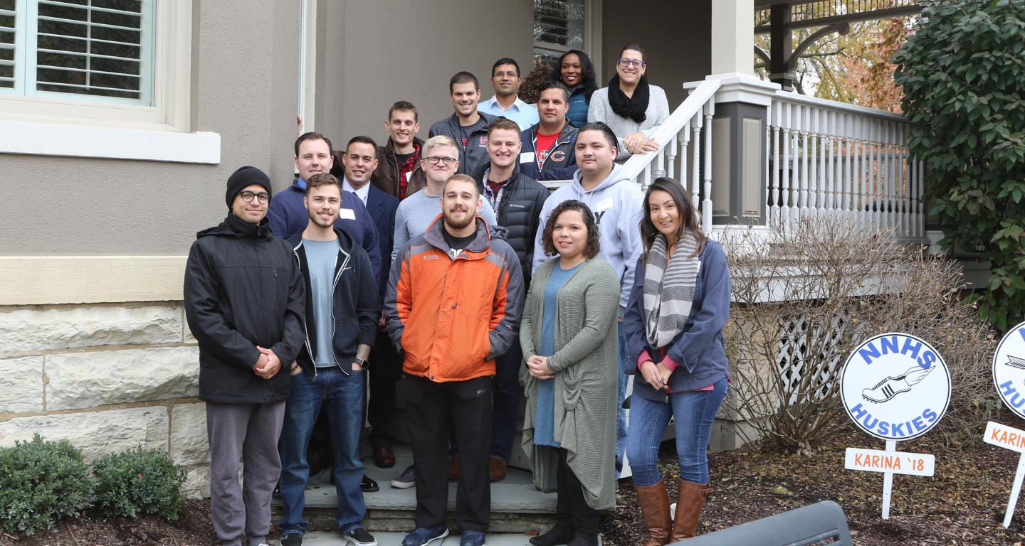 Students visiting the North Central College President's residence on Veterans Day.