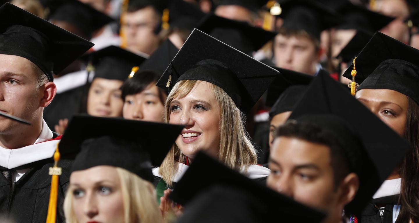 Students at a graduation ceremony.