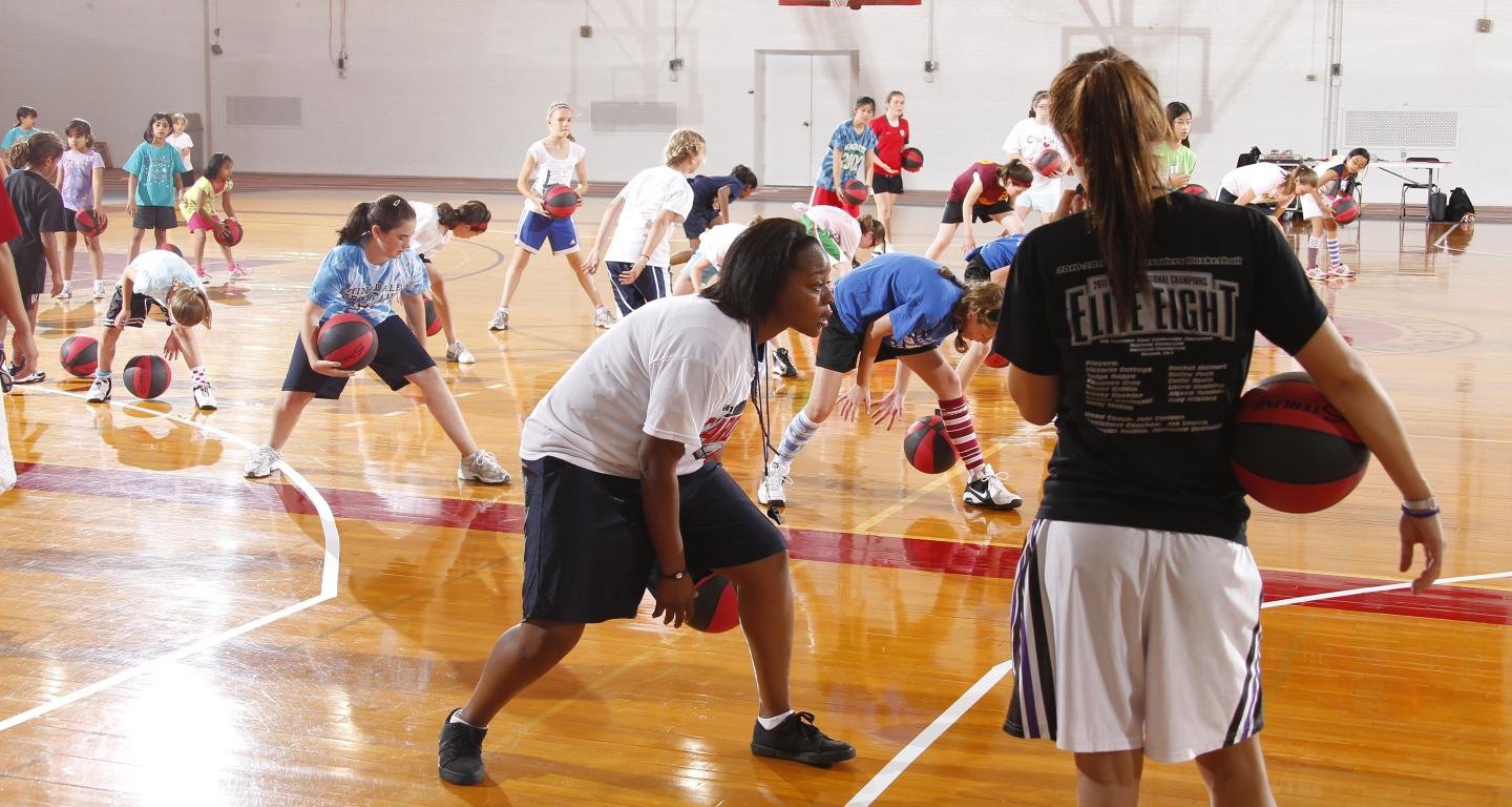 students playing basketball