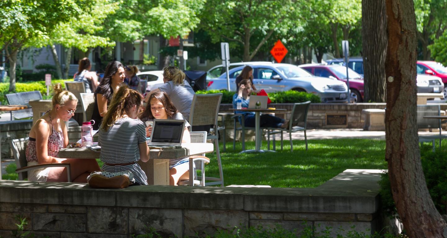 students studying in old main plaza