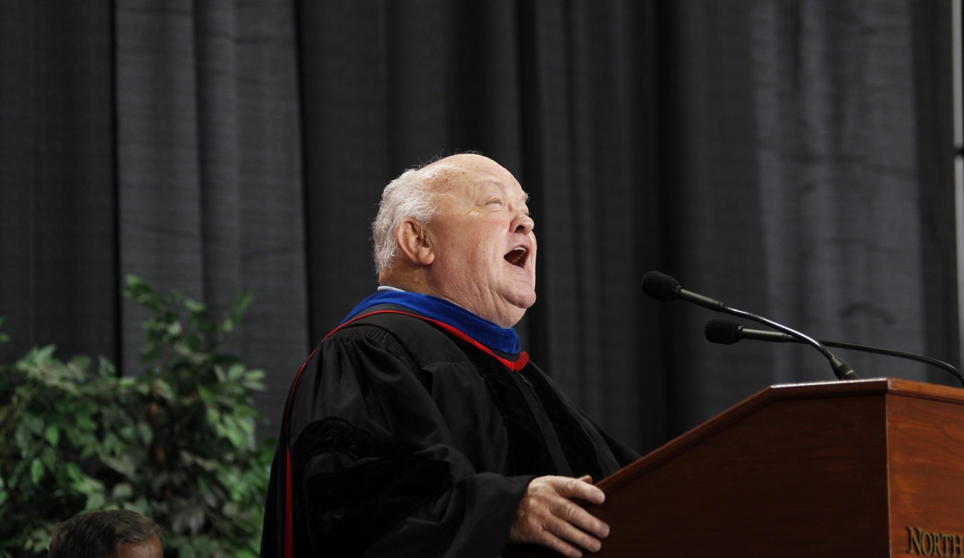 Naperville's longest-serving mayor, A. George Pradel, offers a welcome to students and their families at Commencement in 2012.
