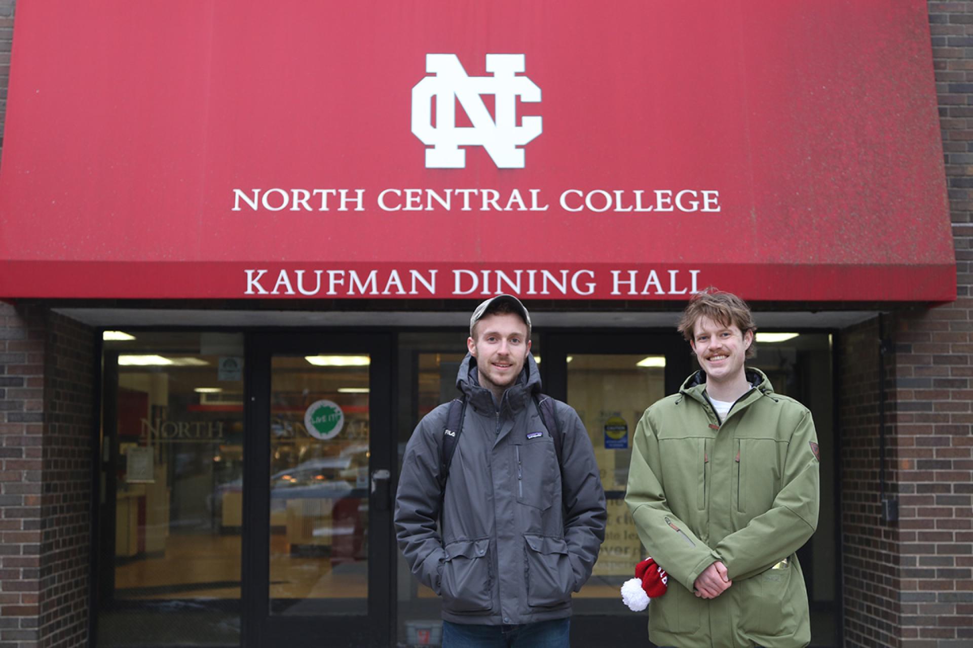 Jake Jaskowiak '19 and Benjamin Ubert '19 stand outside Kaufman Dining Hall