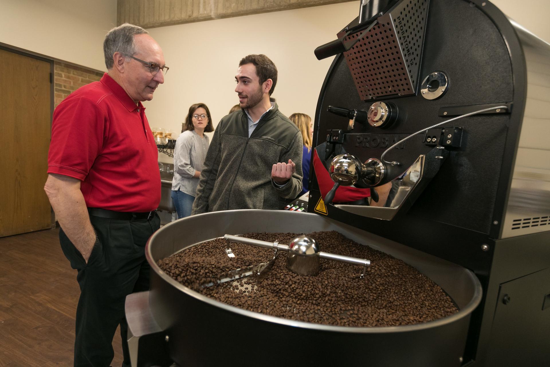 The coffee lab is toured by its founder, Jim McDermet.