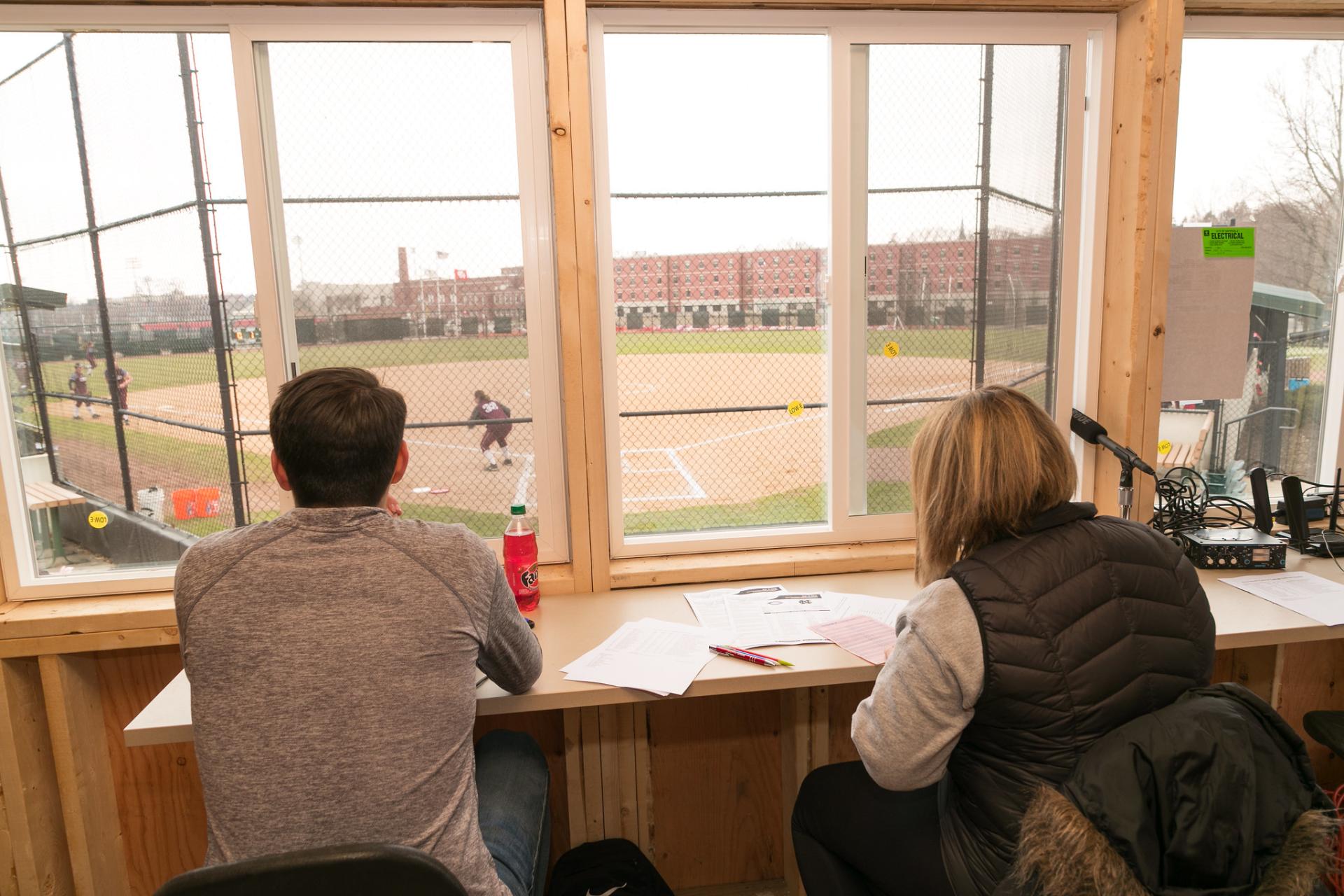 North Central students working inside the newly-donated press box at Shanower Family Field.