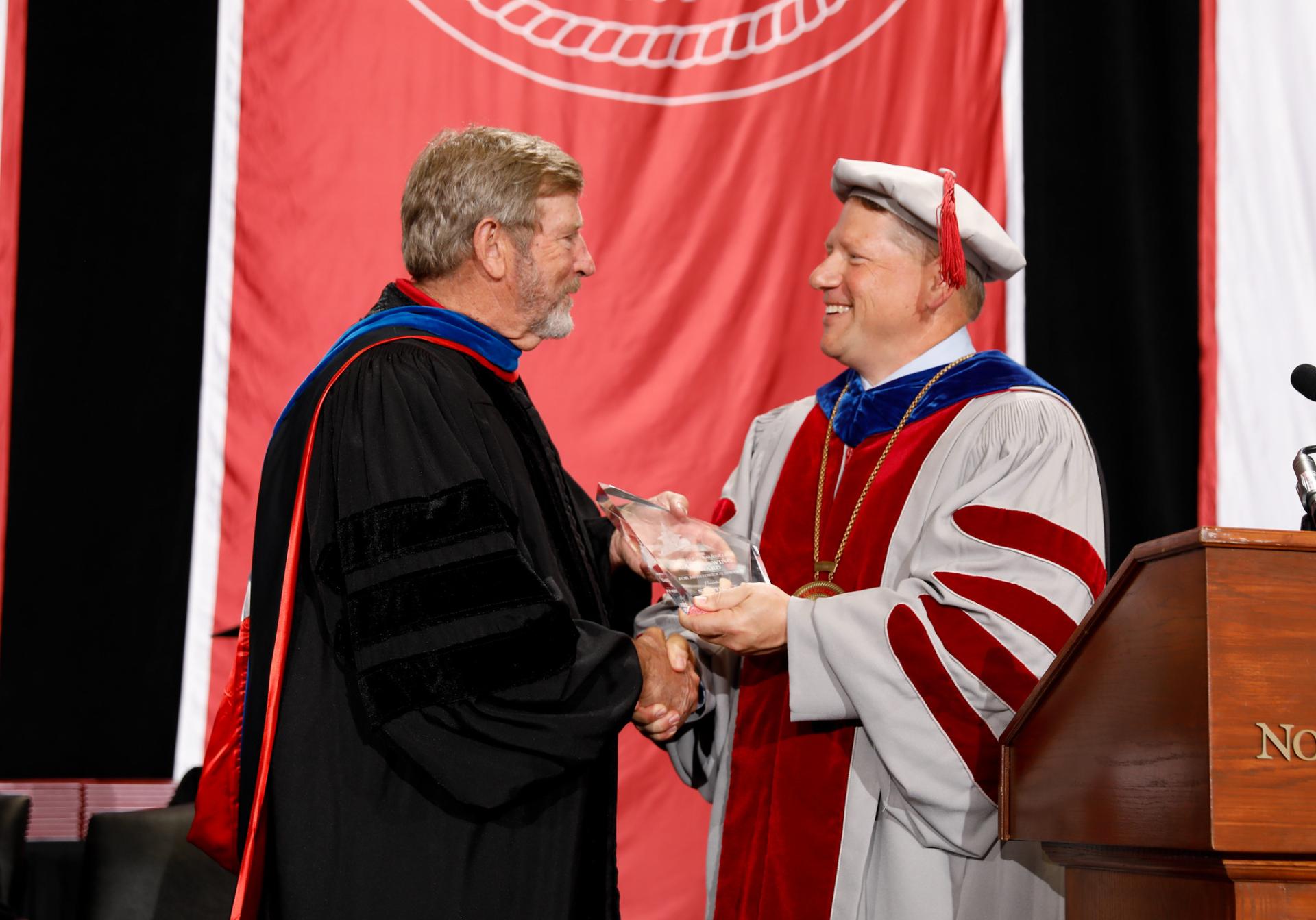 North Central College Swing Award winner Steve Sellers with President Troy Hammond.